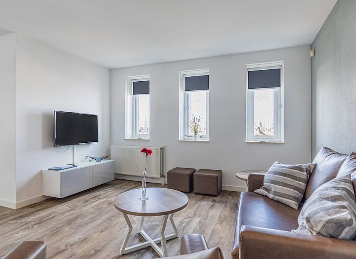 Sfeervolle slaapkamer in appartement CP4 in Hellevoetsluis, Voorne Putten. Comfortabele bedden in een rustige omgeving in Zuid-Holland.