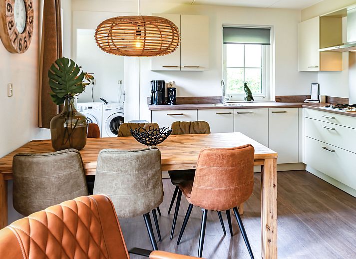 Vacation home Citta Romana in Hellevoetsluis with spacious garden and deck chairs, ideal for relaxation in South Holland.