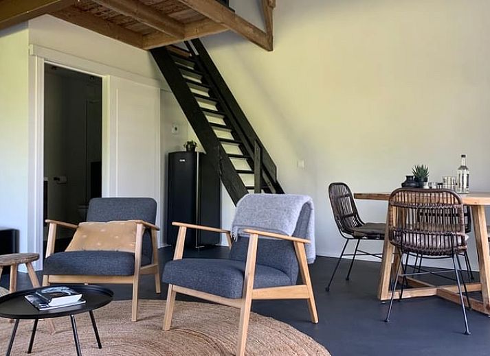 Cozy sitting area in Holiday home in Tinte, ideal for relaxation in South Holland.