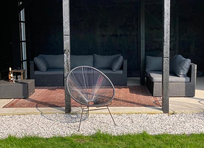 Cozy sitting area in Holiday home in Tinte, ideal for relaxation in South Holland.