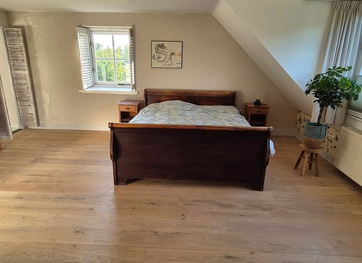 Enjoy the serene sunset at Huisje in Overasselt, located in the beautiful Rijk van Nijmegen, Gelderland.