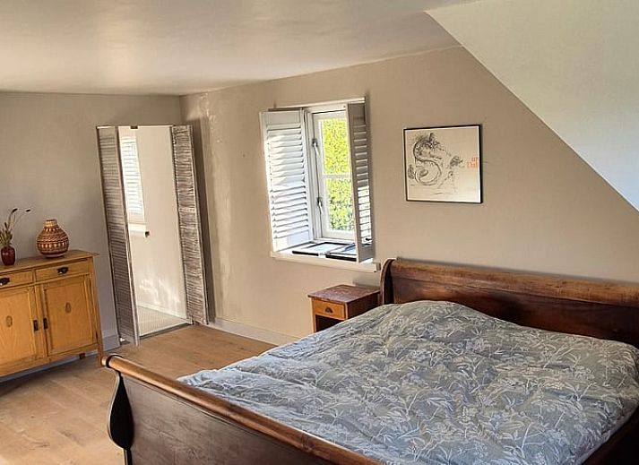 Enjoy the serene sunset at Huisje in Overasselt, located in the beautiful Rijk van Nijmegen, Gelderland.