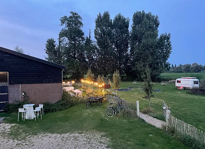 Comfortable sitting area with view in Cottage in Erlecom, Rijk van Nijmegen, Gelderland.