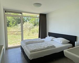 Unterkunft 01011034 - Ferienhaus Texel - Luxe 8 persoons ‘Golf Villa Texel’ vlakbij zee
