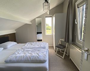 Unterkunft 01011034 - Ferienhaus Texel - Luxe 8 persoons ‘Golf Villa Texel’ vlakbij zee