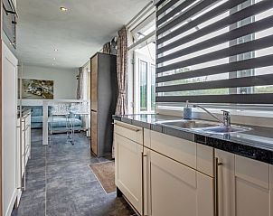 Functionele keukenruimte in Bungalow Duin aan Zee Texel, Bungalowpark Tamarisk, De Cocksdorp met moderne voorzieningen.