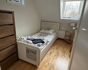 Kinderkamer met knuffels in Vakantiehuisje in De Cocksdorp, Texel.