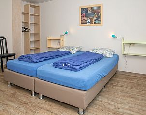 Zweites Schlafzimmer von Bungalow Tamarisk 206, Ferienhaus auf Texel mit reichlich Stauraum.