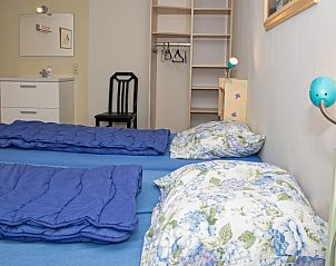 Detail des Schlafzimmers im Bungalow Tamarisk 206, Ferienhaus in De Cocksdorp, Texel mit gemtlicher Einrichtung.