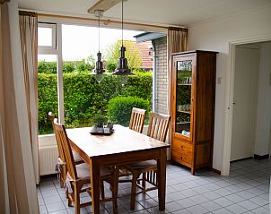 Bright dining room in 9600 - Daalder - Comfort vacation home De Cocksdorp Texel overlooking green garden.