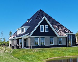 Familiehuis Smit vakantiehuis in De Cocksdorp Texel met ruime tuin en moderne architectuur.