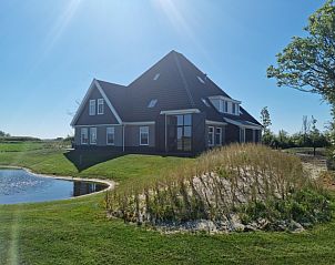 Familiehuis Smit vakantieaccommodatie in De Cocksdorp Texel met uitzicht op de natuur.