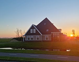 Prachtige zonsondergang bij Familiehuis Smit vakantiehuis in De Cocksdorp Texel, Waddeneilanden.