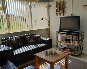 Stilvolle Sitzecke im Ferienhaus Familie Bouthoorn, Sd-Eierland, Texel mit Blick auf die Natur.