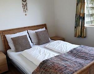 Gemtliches Schlafzimmer im Ferienhaus Familie Bouthoorn, Sd-Eierland, Texel mit bequemem Bett.