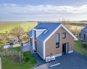 Freistehendes Haus in De Cocksdorp, Texel, mit Blick ber weite Felder von der Terrasse, ideales Ferienhaus auf den Watteninseln.
