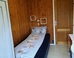Knusse kinderkamer in Vakantiehuis Slufterhoek 076 in De Cocksdorp Texel met eenpersoonsbed