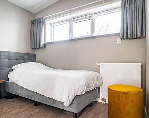 Gezellige eenpersoonskamer in Type C Appartement de Stoeterij, De Cocksdorp, Texel met stijlvolle inrichting.