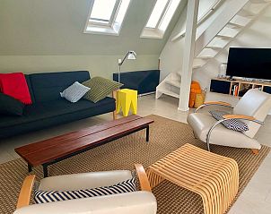 Gezellige woonkamer in Frederik en Lodevika vakantiehuis, De Cocksdorp, Texel, Waddeneilanden.