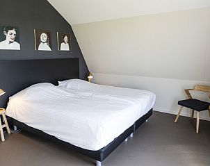 Comfortabele slaapkamer in Frederik en Lodevika vakantiehuis, De Cocksdorp, Texel, Waddeneilanden.