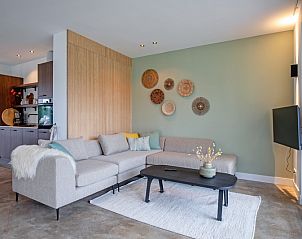 Moderne Sitzecke im Ferienhaus Griend auf Texel, ideal zum Entspannen.