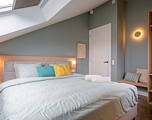 Gerumiges Schlafzimmer des Ferienhauses Griend, De Cocksdorp, Texel mit viel Licht.
