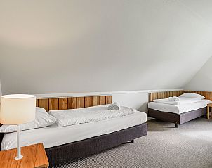 Achtertuin met terras in Sluftervallei 8-persoons bungalow 8L, De Cocksdorp, Texel.