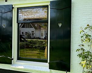 Ruime tuin van Paal 91 Texel in De Cocksdorp, perfect voor buitenactiviteiten op Texel, Waddeneilanden.