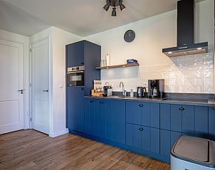 Moderne keuken in Appartement B, een vakantiehuis in De Cocksdorp, Texel, met complete uitrusting.