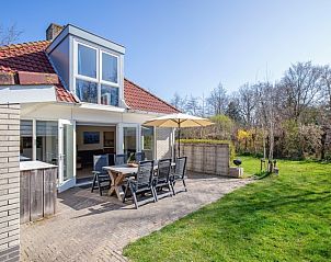 Zonnig terras van Bungalowpark Slufterduin - 't Oppertje, vakantiehuis in De Cocksdorp, Texel.
