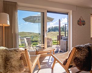 Kaap Zilt vacation home in De Cocksdorp, Texel, surrounded by nature and wide views, ideal for rest and relaxation.