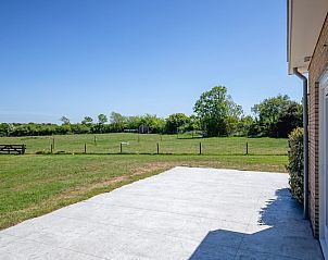 Uitzicht vanaf het terras van Texels Vakantiehuis in De Cocksdorp, geniet van rust op Texel, Waddeneilanden.