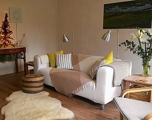 Cozy interior of Huisje in De Cocksdorp, vacation home in De Cocksdorp, Texel, with warm decoration.