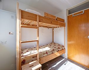 Kinderkamer met stapelbed in Vakantiehuis Slufteroord 292, Bungalowpark Slufteroord, De Cocksdorp, Texel, perfect voor gezinnen.