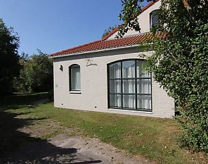 Das Ferienhaus D 603 in De Cocksdorp, Texel, bietet einen ruhigen Auenbereich inmitten grner Natur auf den Watteninseln.