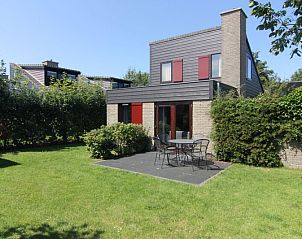 Vakantiehuis B 373, een charmant vakantiehuis in De Cocksdorp op Texel, met een zonnig terras en omringd door groene natuur op de Waddeneilanden.