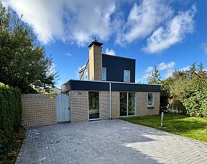 Vakantiehuis A 381 in De Cocksdorp, Texel, biedt een rustige verblijfplaats met een ruime tuin en moderne architectuur op de Waddeneilanden.