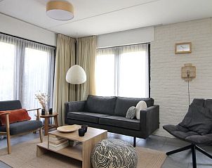 Stijlvolle woonkamer van Vakantiehuis B 271 in De Cocksdorp, Texel, biedt comfort en rust op de Waddeneilanden.