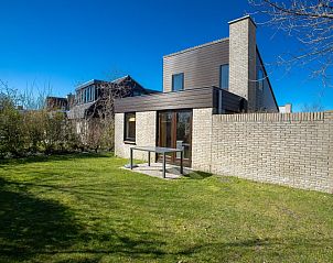 Vacation home B 195 in De Cocksdorp, Texel offers a sunny garden and terrace for a relaxing stay on the Wadden Islands.