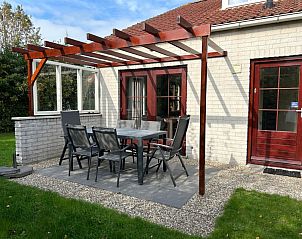 Vakantiehuis D 531 in De Cocksdorp, Texel, met zonnig terras en comfortabele zitruimte, ideaal voor ontspanning op de Waddeneilanden.