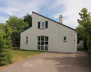 Vakantiehuis E 417 in De Cocksdorp, Texel, Waddeneilanden, biedt een charmant verblijf met ruime tuin en rustieke uitstraling.