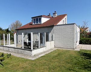Vakantiehuis D 485 in De Cocksdorp, Texel met zonnige veranda en groene tuin, ideale vakantiewoning op de Waddeneilanden.