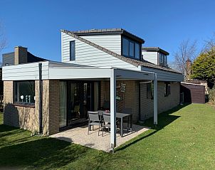 Vakantiehuis A 143 in De Cocksdorp, Texel biedt een zonnig terras en moderne architectuur voor een ontspannen verblijf op de Waddeneilanden.