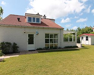 Vakantiehuis D 415 in De Cocksdorp, Texel biedt een charmant verblijf met een zonnig terras en groene tuin op de Waddeneilanden.