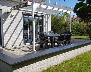 Vakantiehuis D 612 in De Cocksdorp, Texel, met zonnig terras en tuin, ideaal voor een ontspannen verblijf op de Waddeneilanden.