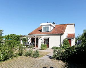 Ferienhaus D 401 in De Cocksdorp, Texel mit sonniger Terrasse und grner Umgebung, ideal fr einen erholsamen Aufenthalt auf den Watteninseln.