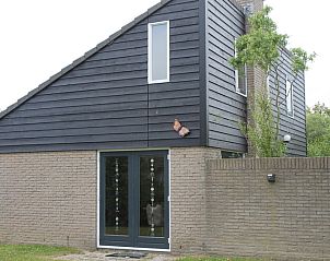 Vakantiehuis A 267 in De Cocksdorp, Texel, biedt een moderne uitstraling met natuurlijke omgeving op de Waddeneilanden.