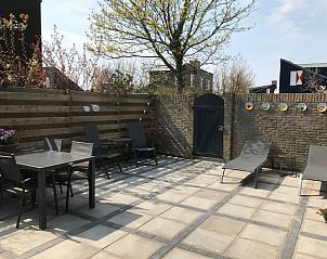 Geniet van de zonnige patio bij Vakantiehuis B 193 in De Cocksdorp, Texel. Perfect voor ontspanning op de Waddeneilanden.