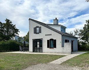 Vacation home E 645 in De Cocksdorp on Texel, a charming vacation home surrounded by nature on the Wadden Islands with inviting terrace.