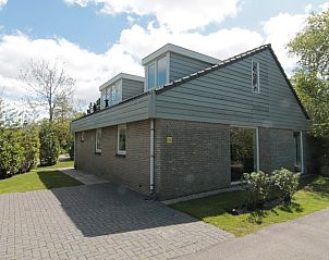 Vakantiehuis G 263 in De Cocksdorp, Texel biedt een charmant verblijf met moderne architectuur omgeven door groene natuur en rustige omgeving.